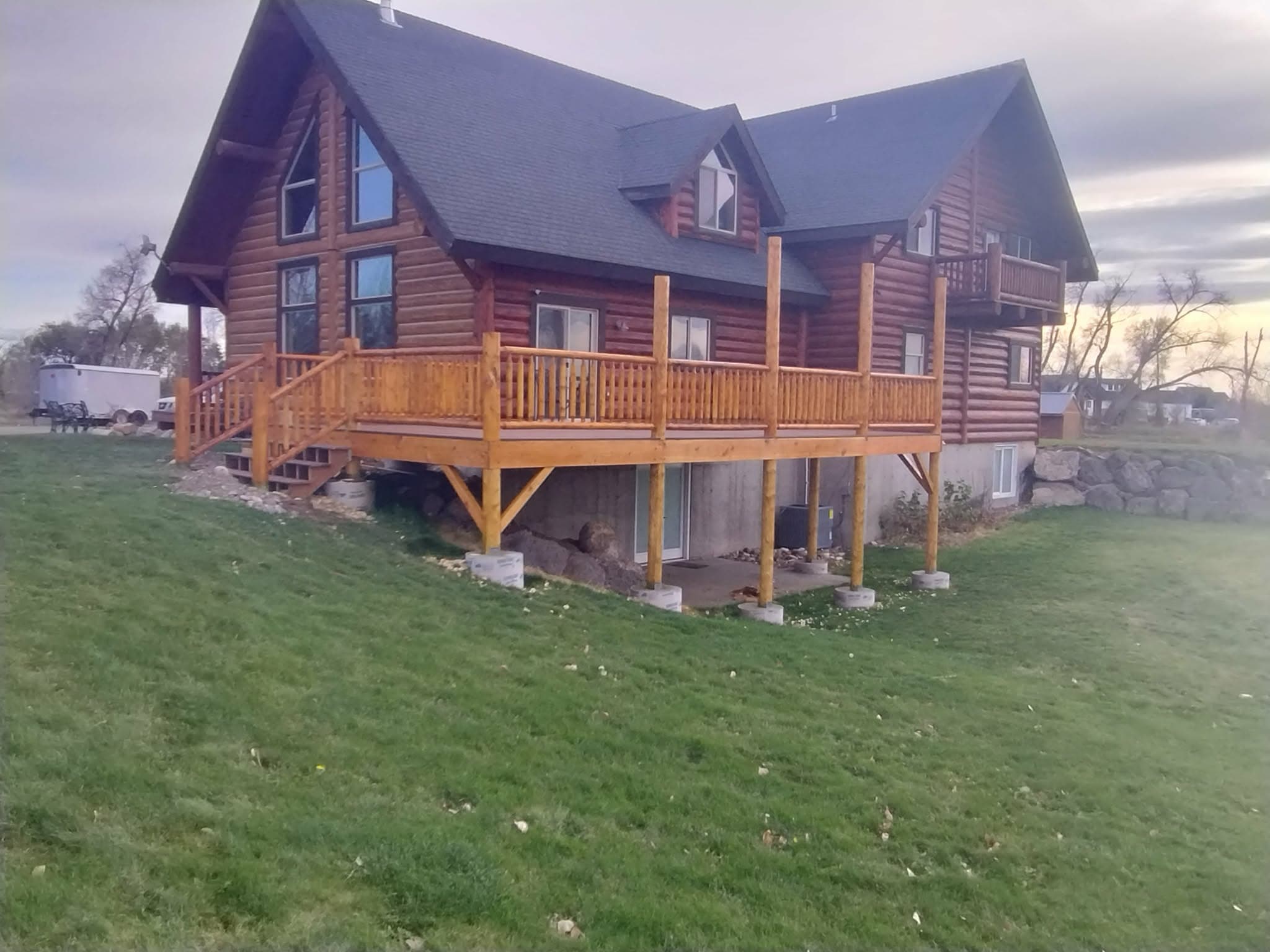 Custom wooden deck construction in Idaho Falls backyard